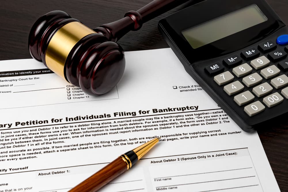 Bankruptcy Bankruptcy Papers, Judges Hammer And A Calculator On The Table